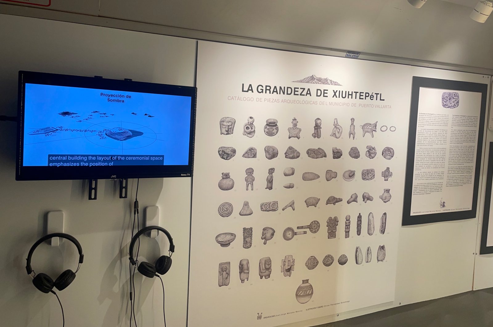 L&aacute;mina del cat&aacute;logo La Grandeza de Xiuhtepetl y pantalla con la proyecci&oacute;n de sombra